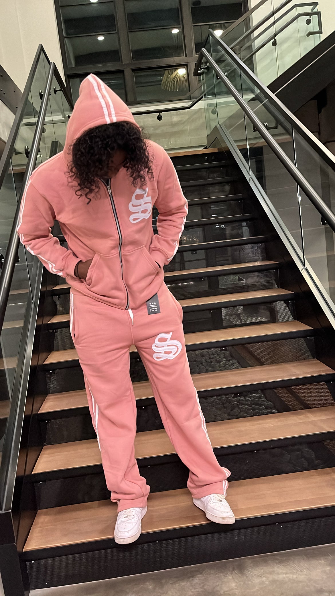 Pink sweatsuit.