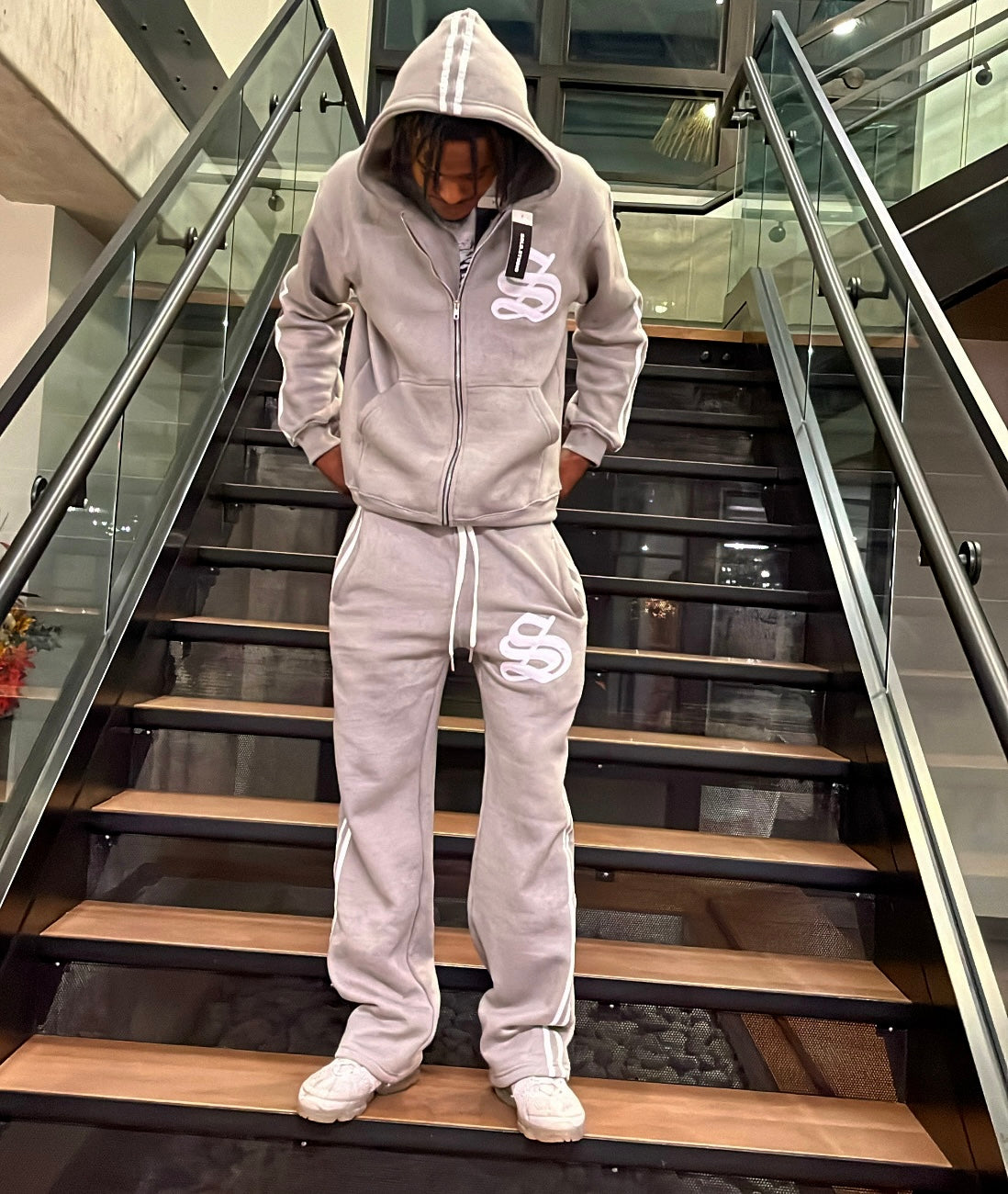 Grey sweatsuit.